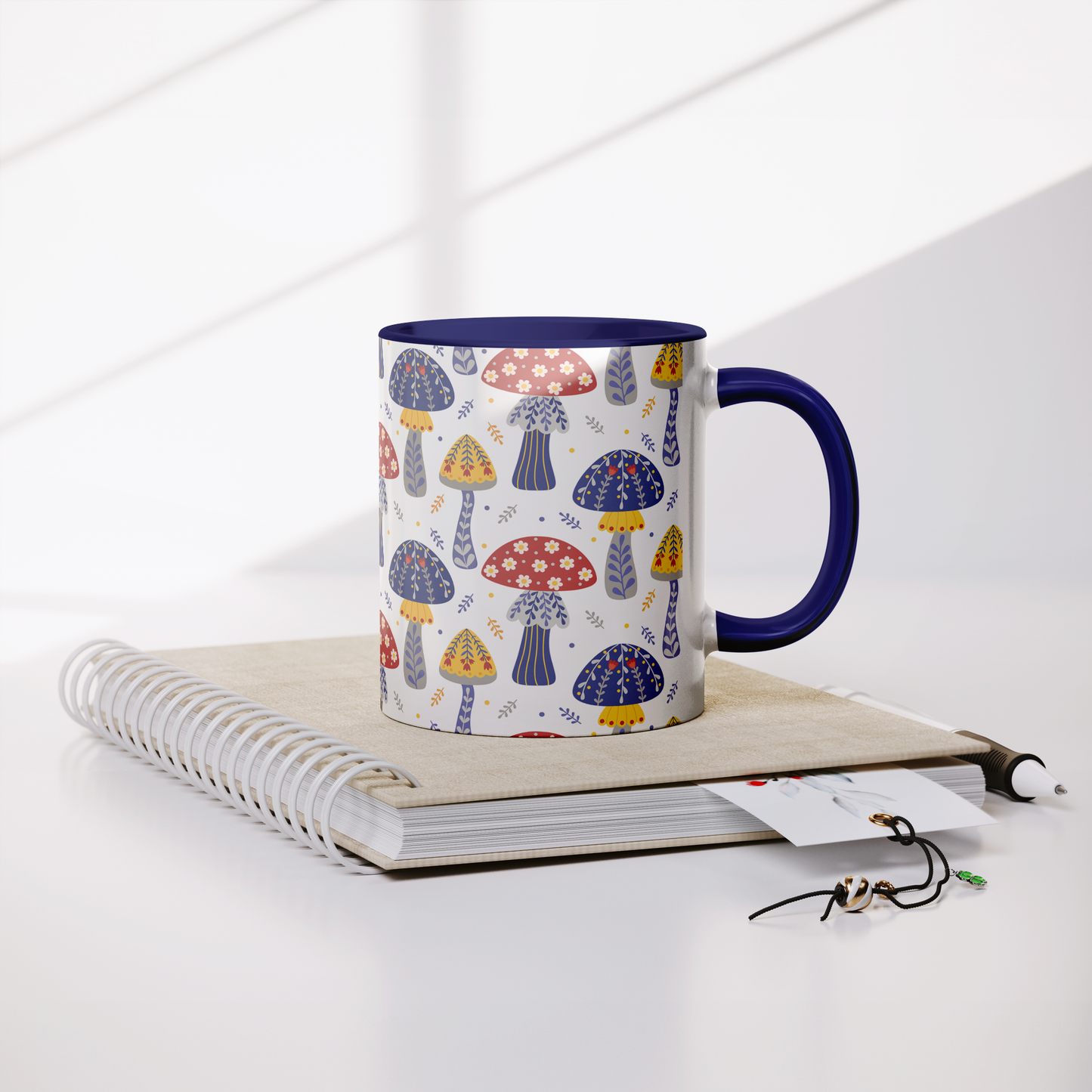 11_oz_Mug__Mushrooms_Blue_fairecom_Notebook_Mockup.png