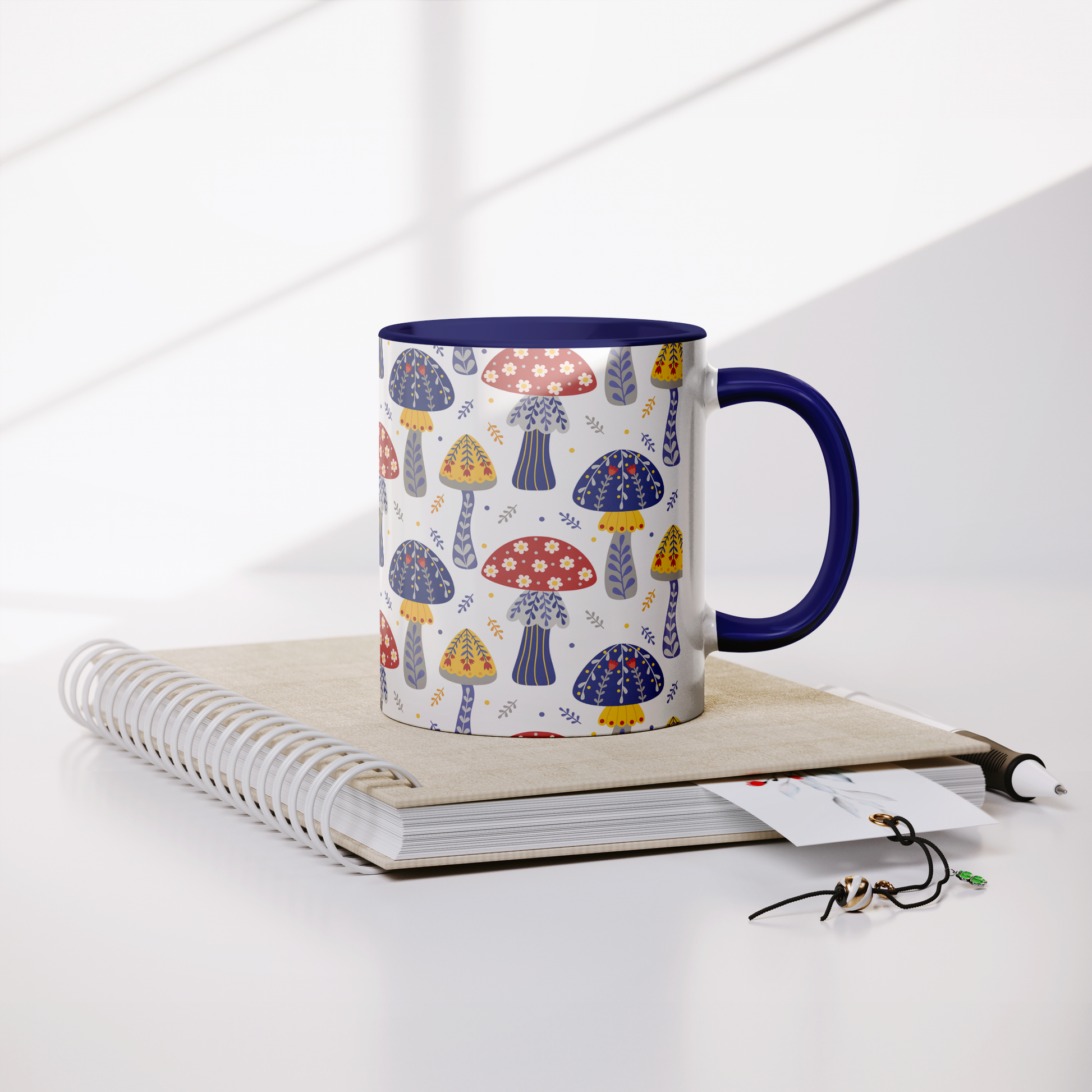 11_oz_Mug__Mushrooms_Blue_fairecom_Notebook_Mockup.png