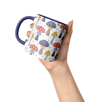 11_oz_Mug__Mushrooms_Blue_fairecom_Raised_Hand_Mockup.png