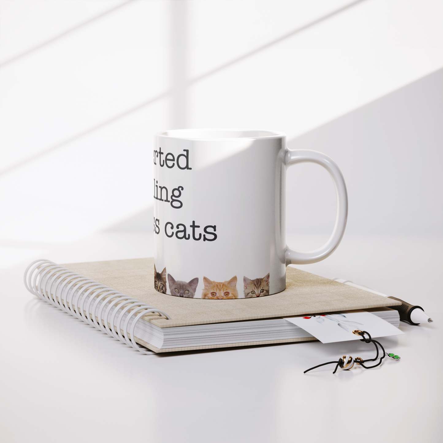 11oz_cats_Lifestyle_Notebook_Mockup.png