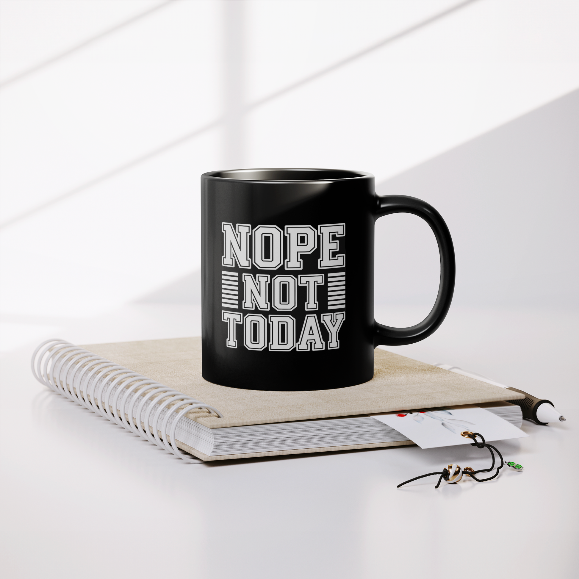 Nope_Not_Today_Mug__11_oz_Black_Ceram_Lifestyle_Notebook_Mockup.png